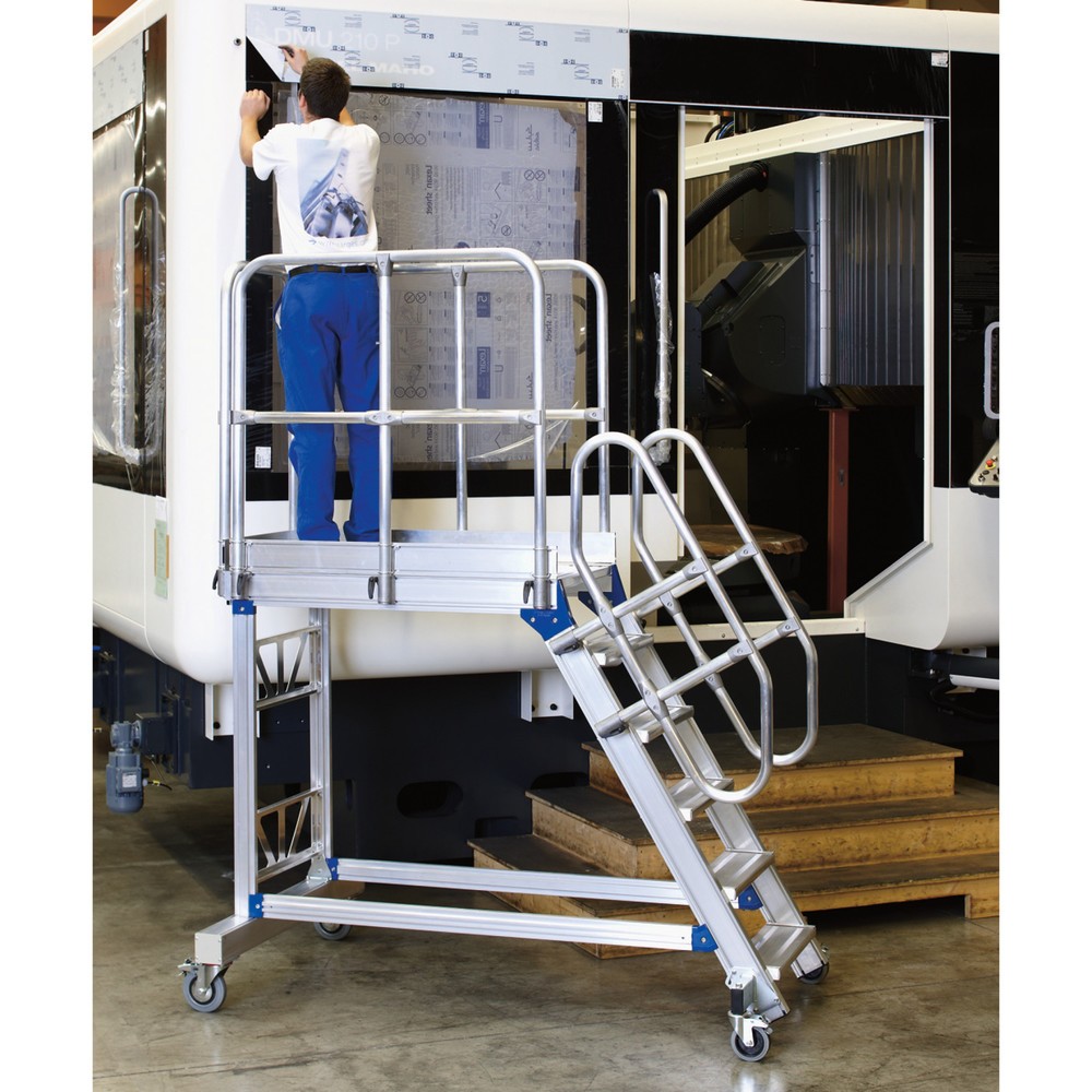 Image of Die Podesttreppe ZARGES aus Aluminium: Optimal für ergonomisches Arbeiten Ermöglichen Sie Ihren Mitarbeitern das komfortable Arbeiten in der Höhe und entscheiden Sie sich für die robuste Podestleiter ZARGES. Dank der grossen Plattform behalten Sie die vol
